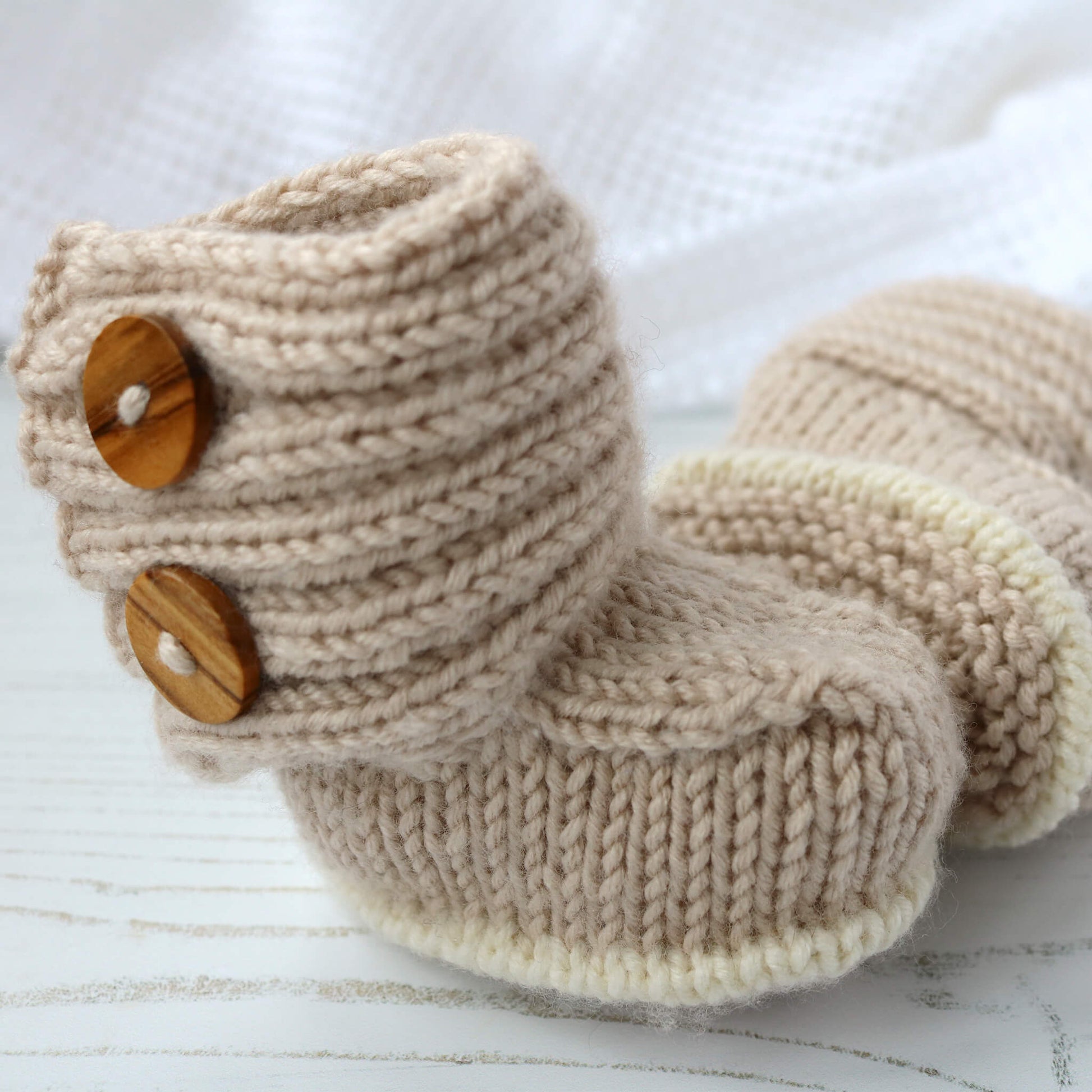 baby booties knitting pattern with button fastening